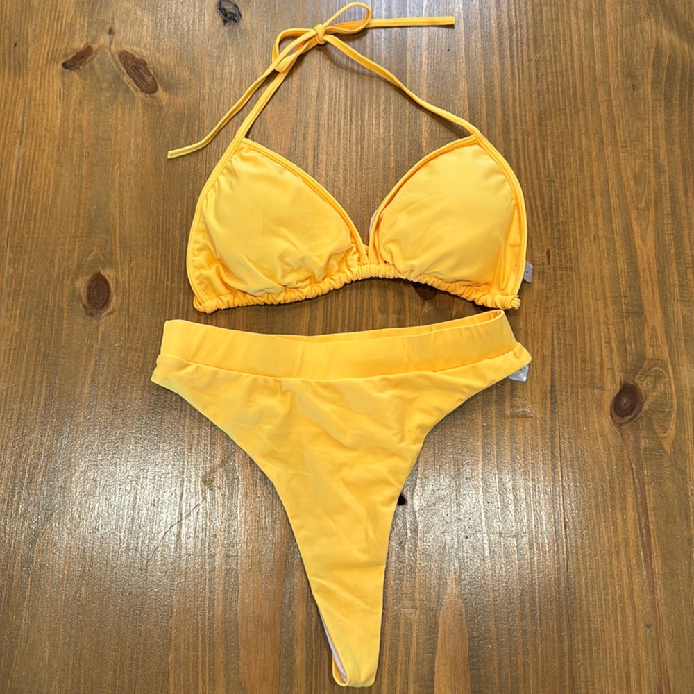 Yellow triangle adjustable tie neck and back bikini 2 piece NWOT Large swimwear